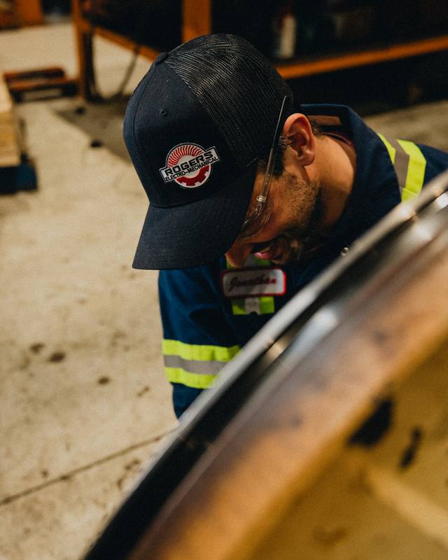 Rogers technician at work in the shop