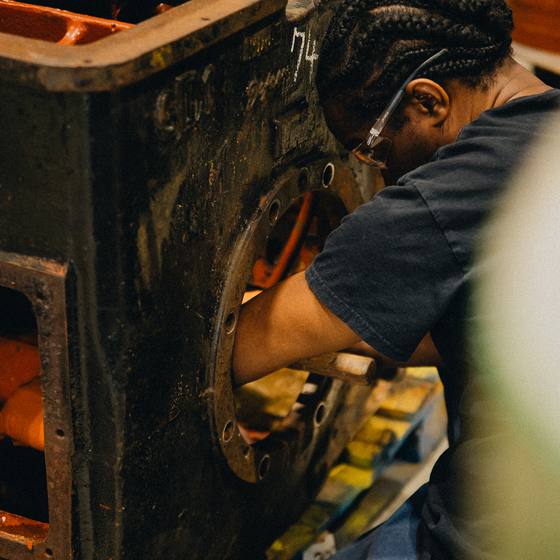 Technician performing field service on site