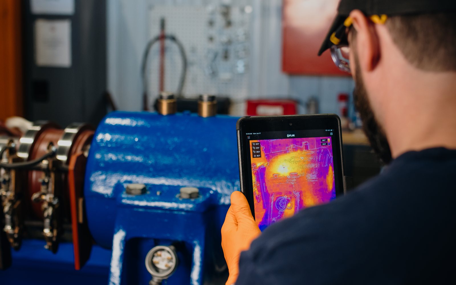 Technician reviewing a thermal scan on the imager